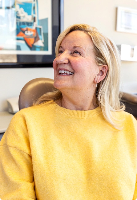 Smiling female patient feeling comfortable and at ease during a visit at Dr. Andrew Jackson DDS in Nashville, TN