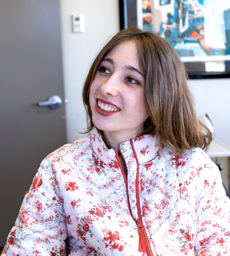 Smiling young woman who is a candidate for Invisalign clear aligner treatment at Dr. Andrew Jackson DDS in Nashville, TN